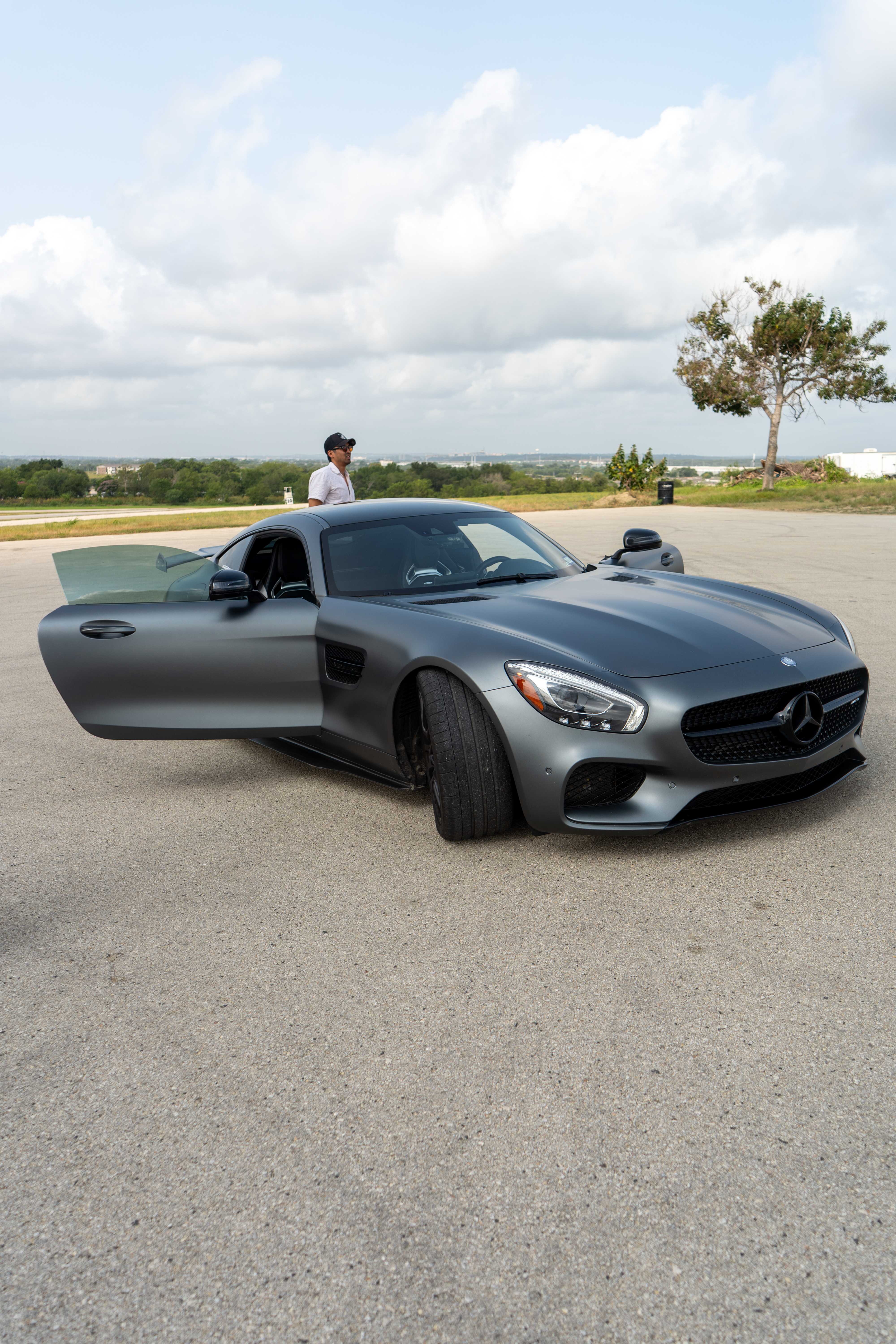 Mercedes-AMG GT, door open, hilltop overlook