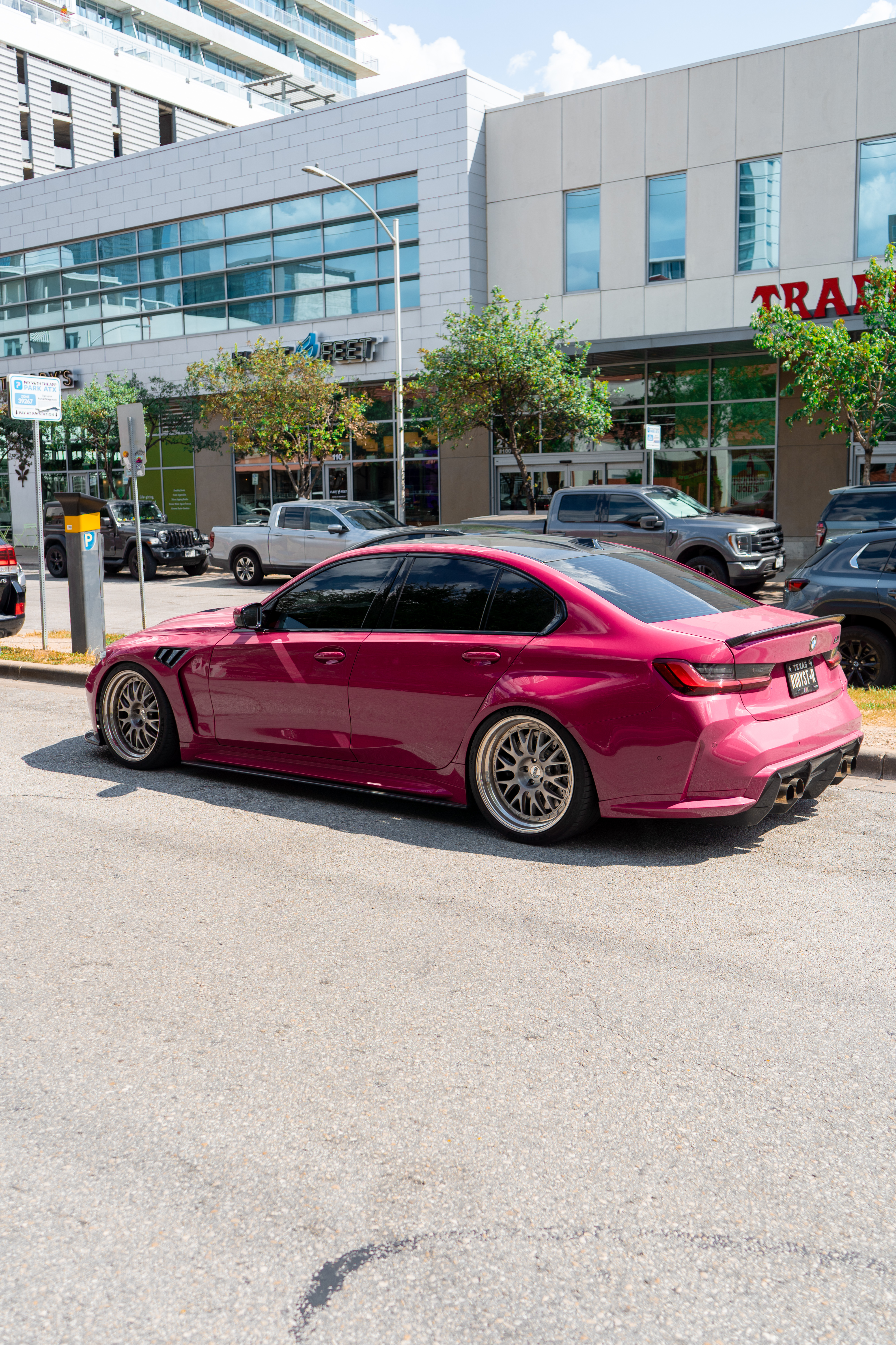 BMW M3, pink widebody, rear three-quarter