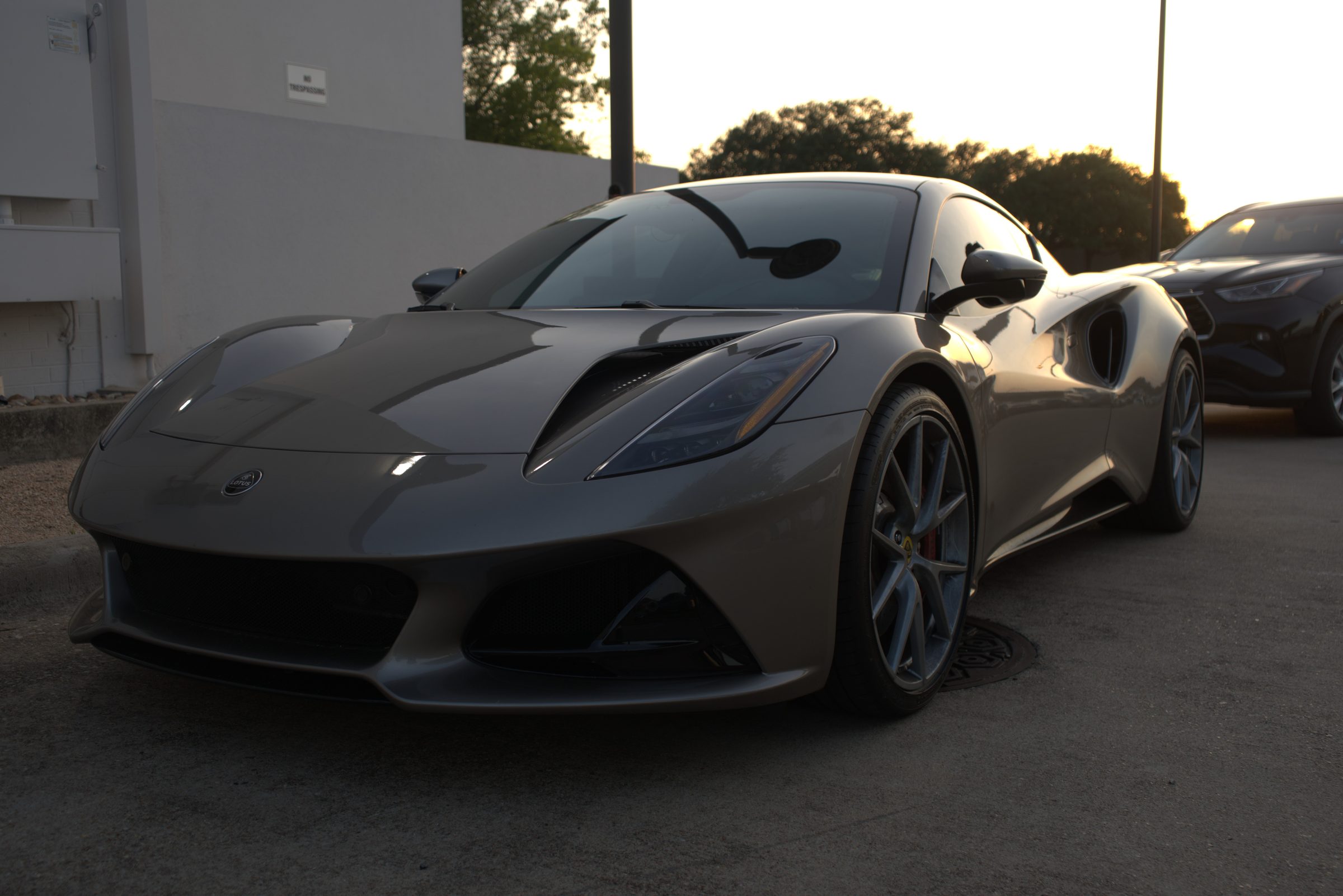 Lotus Emira at dusk, front three-quarter