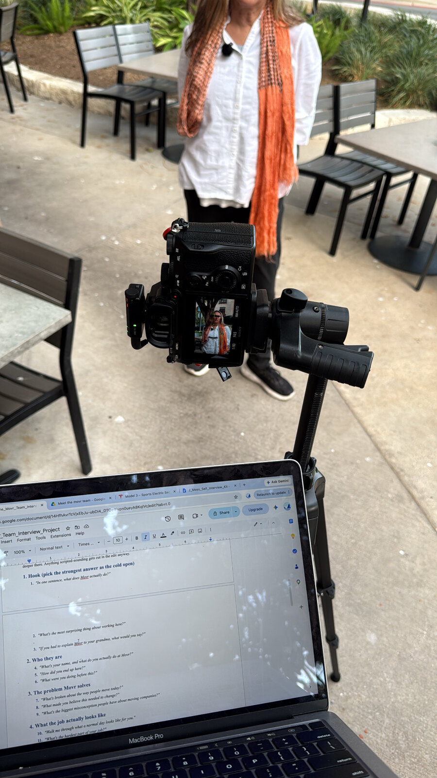 Dom directing an on-location interview shoot