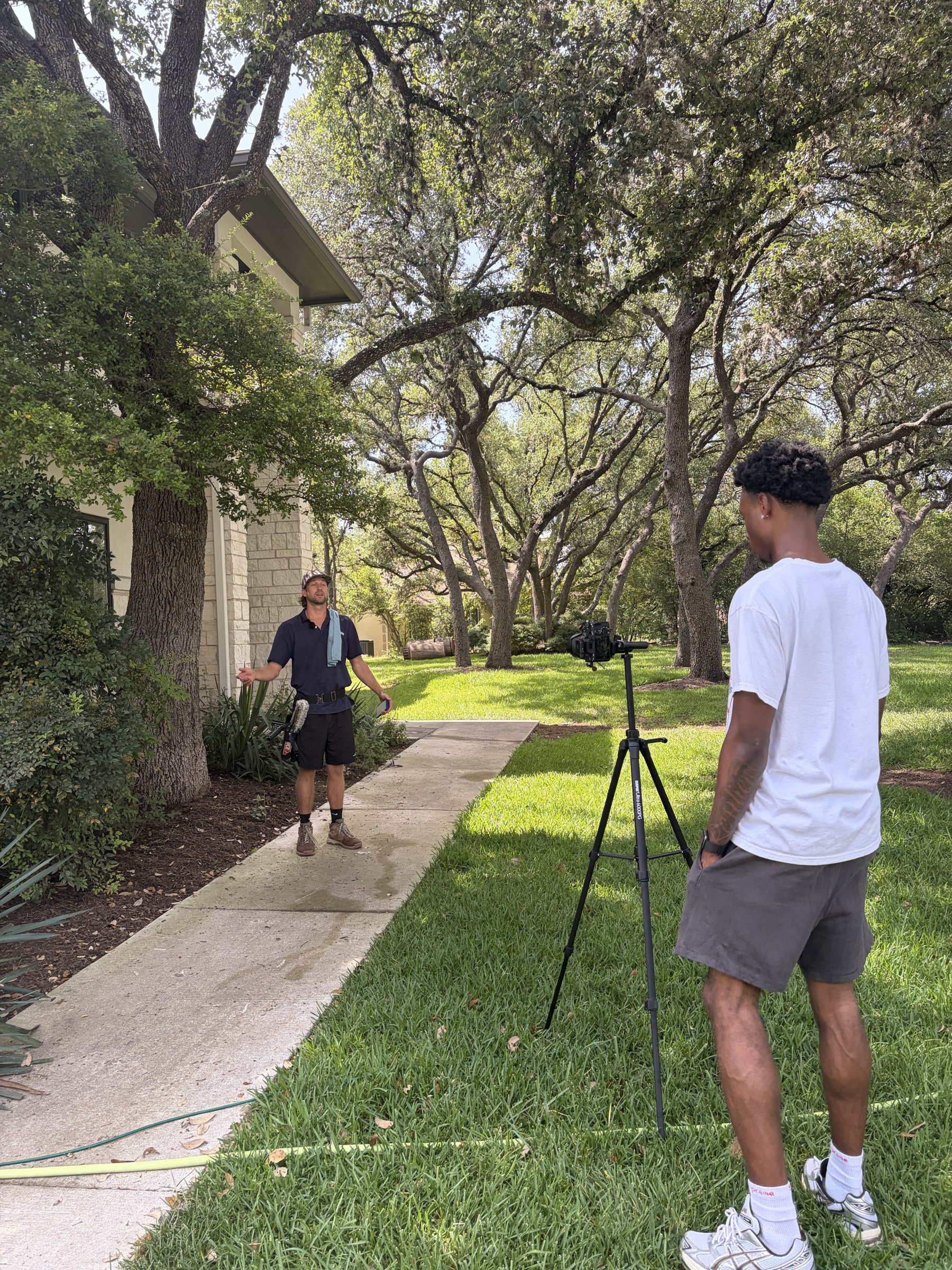 Dom filming an on-location interview