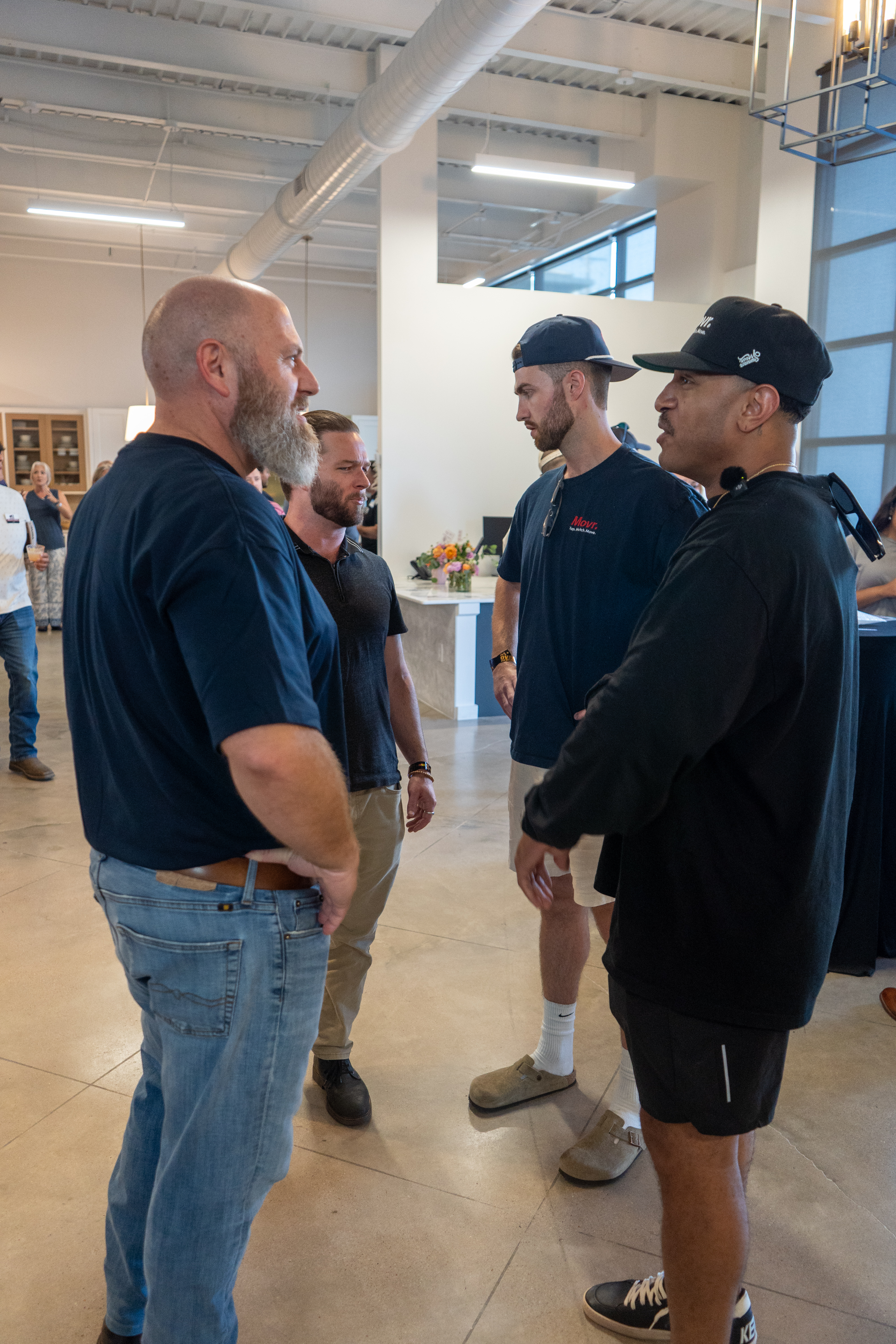 Movr team, group conversation at the showroom