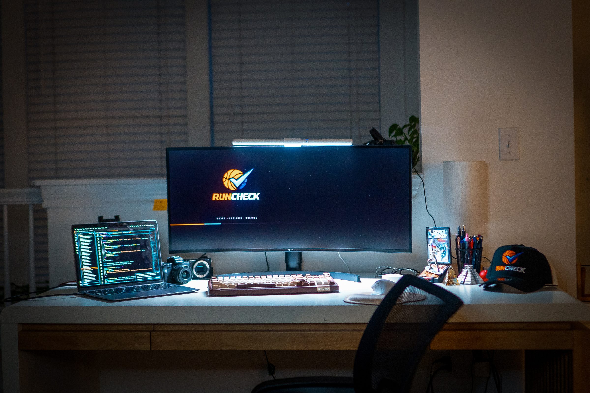 Runcheck founder's desk setup, wide shot