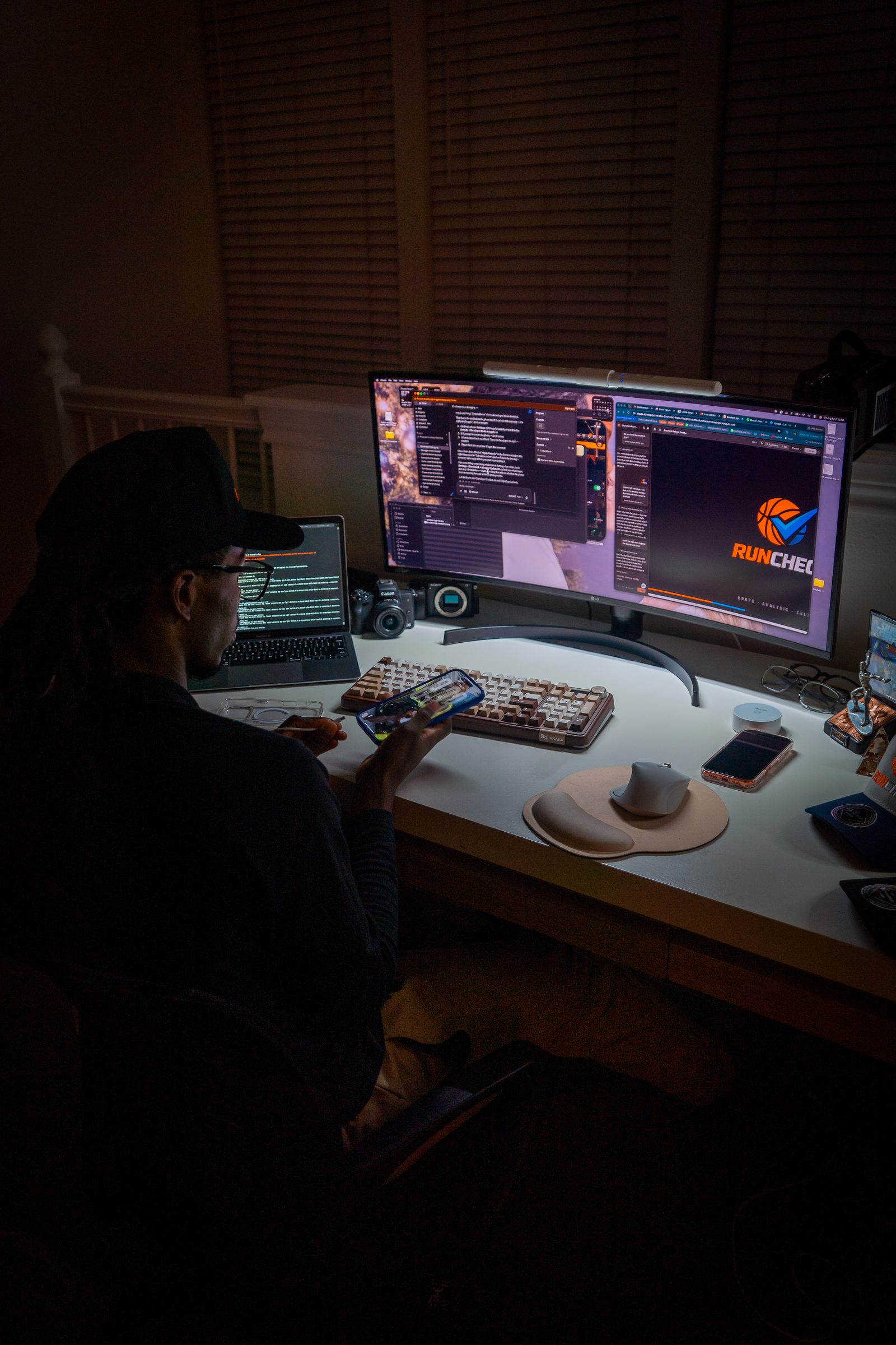 Runcheck founder working at his desk
