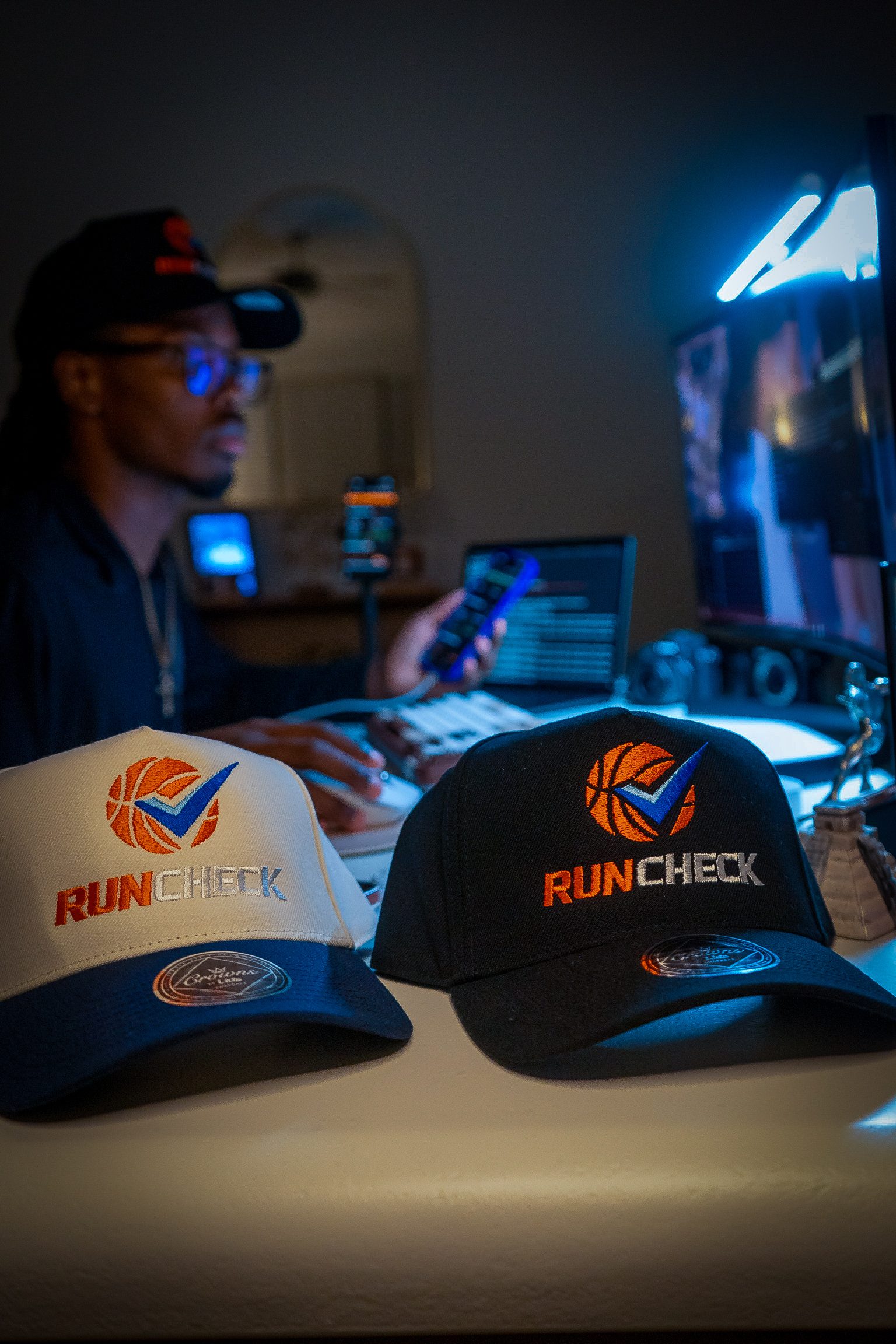 Runcheck branded caps, detail shot